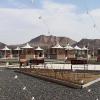 Outdoor gazebos and seating areas adjacent to the outdoor parking and the main entrance